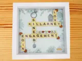 Personalised engagement frame names date lovebirds ring